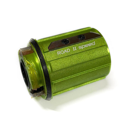 Shimano 365 Freehub – green aluminum freehub body compatible with 8–12 speed Shimano and SRAM systems.